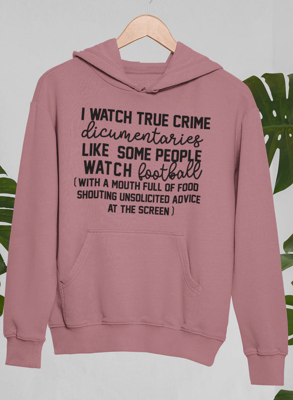 Cozy hoodie featuring the phrase 'I Watch True Crime Like Some People Watch Football' designed for true crime enthusiasts.