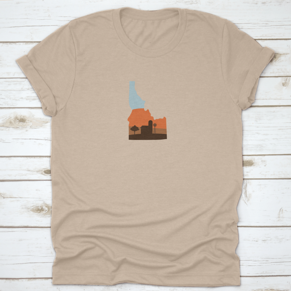 Idaho state shape design featuring a farm at sunset with a windmill and barn, showcasing vibrant colors.