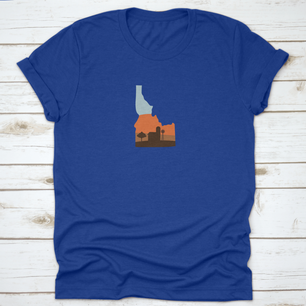 Idaho state shape design featuring a farm at sunset with a windmill and barn, showcasing vibrant colors.