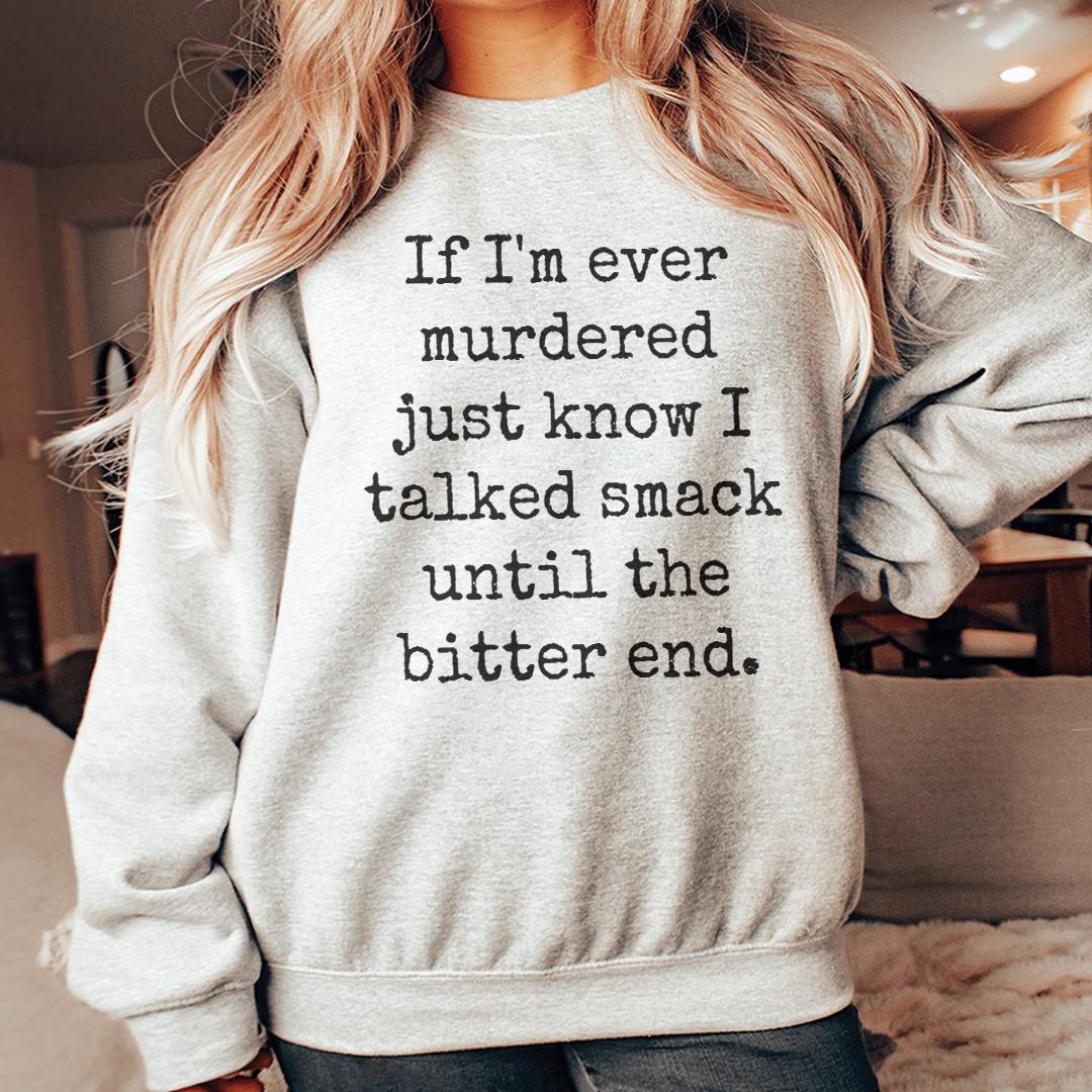 A cozy hoodie featuring the phrase 'If I'm Ever Murdered Just Know I Talked Smack Until', designed by top artists, showcasing a stylish and humorous design.