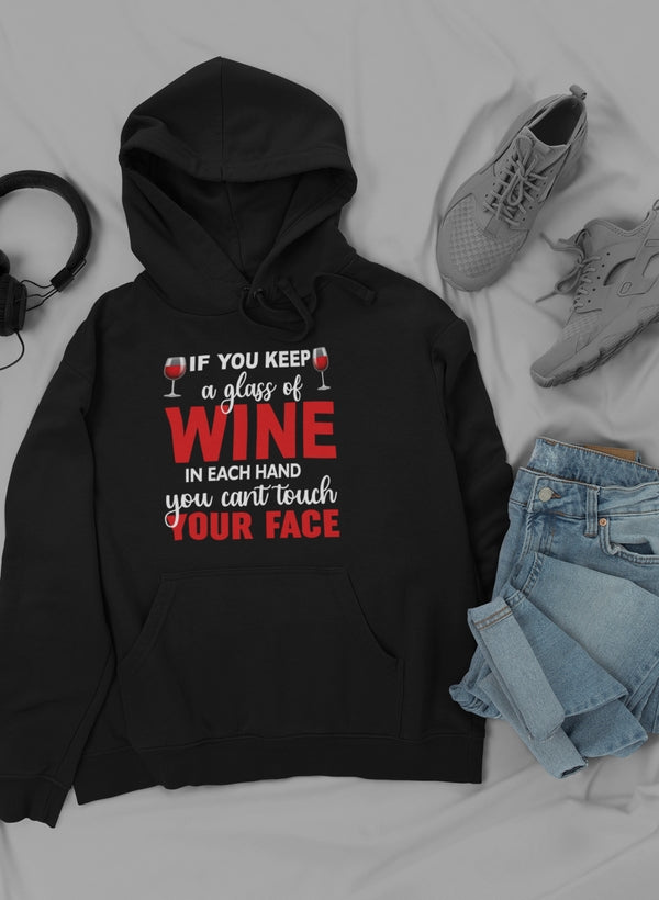 A cozy hoodie featuring a unique wine-themed design, made from a soft cotton/poly fleece blend, perfect for wine lovers.