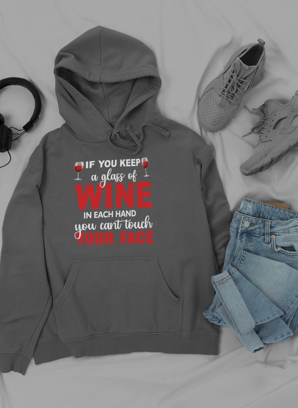 A cozy hoodie featuring a unique wine-themed design, made from a soft cotton/poly fleece blend, perfect for wine lovers.
