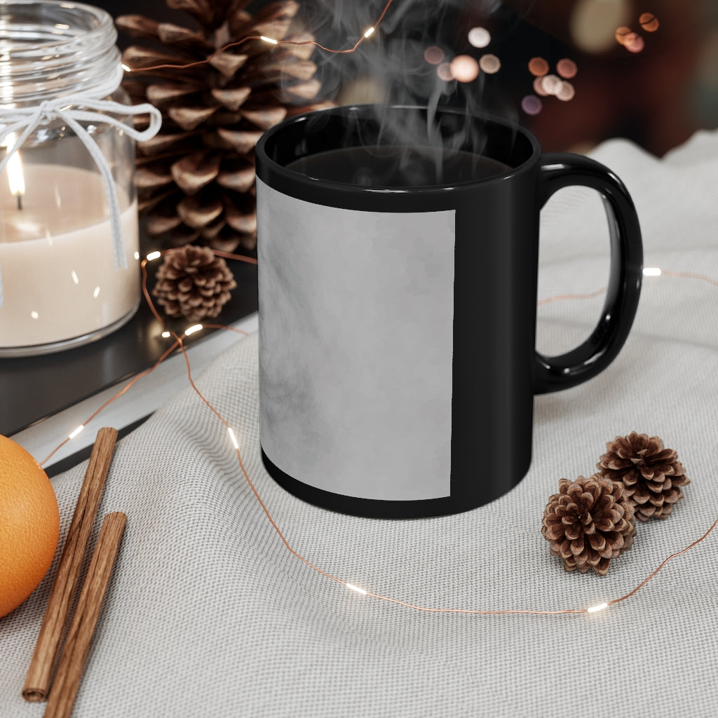 Illusion 11oz Black Mug showcasing a sleek black ceramic design, perfect for coffee, tea, or hot chocolate.