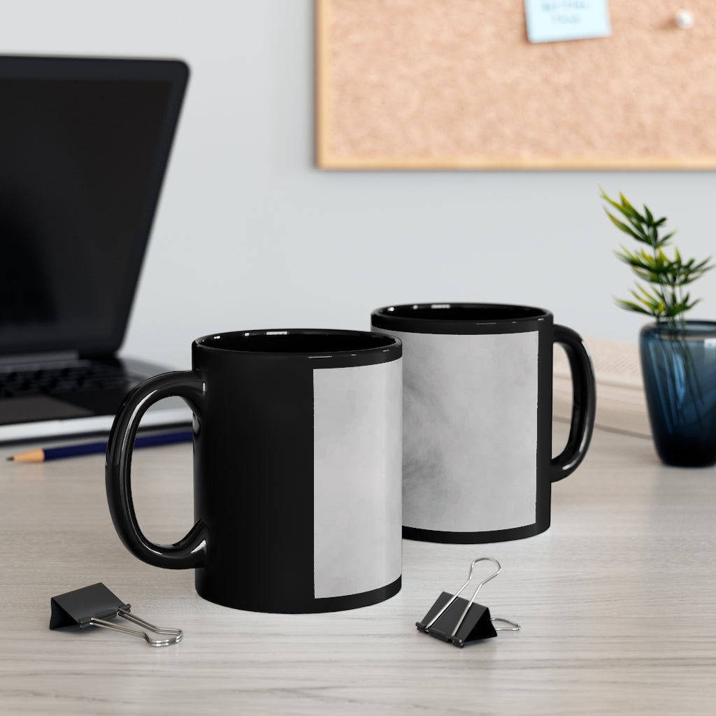 Illusion 11oz Black Mug showcasing a sleek black ceramic design, perfect for coffee, tea, or hot chocolate.