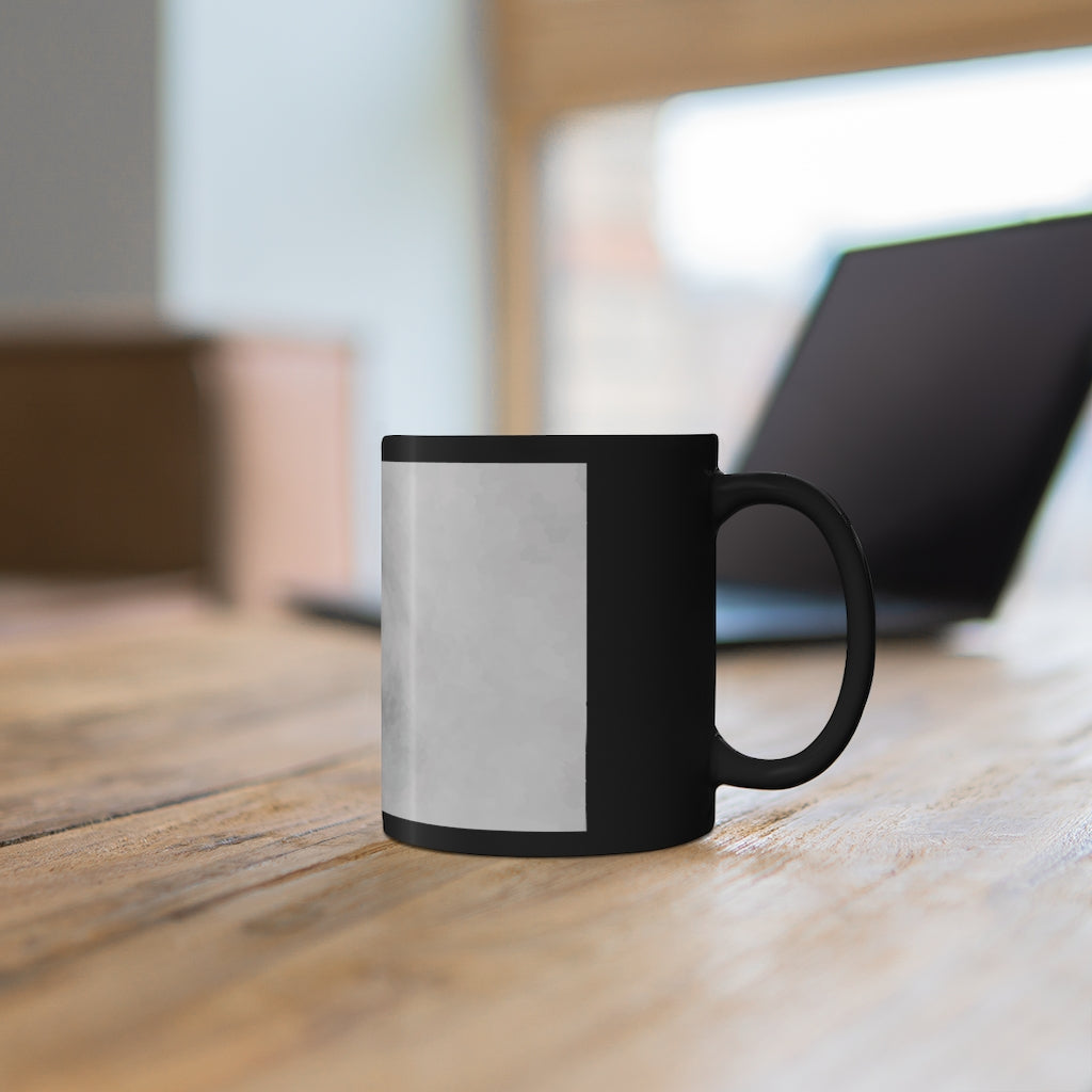 Illusion 11oz Black Mug showcasing a sleek black ceramic design, perfect for coffee, tea, or hot chocolate.