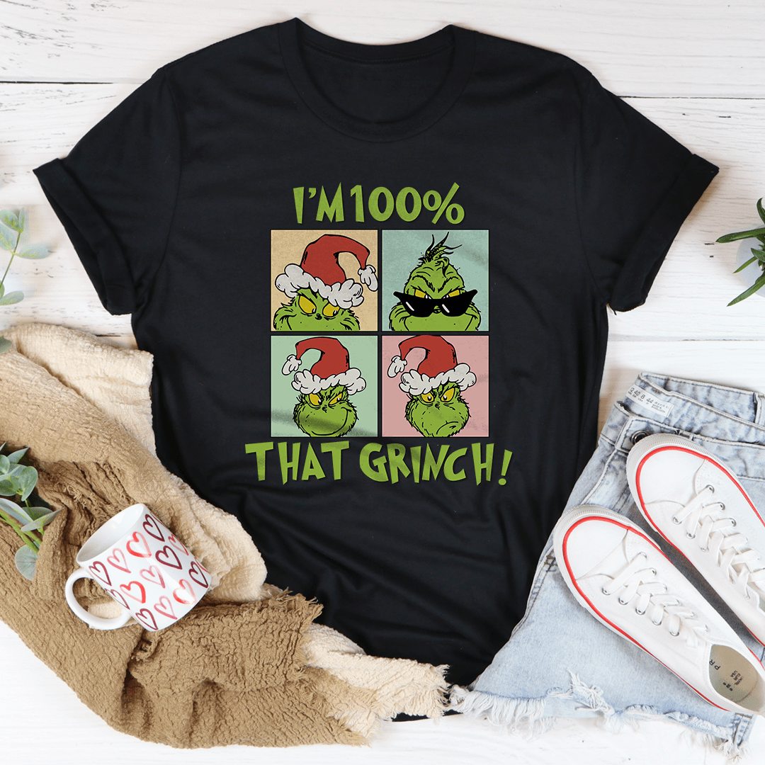 A festive I'm 100% That Grinch Tee made from 100% soft cotton, featuring a playful Grinch design, perfect for holiday celebrations.