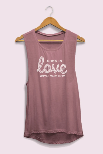 Two stylish muscle tank tops featuring romantic phrases, perfect for bachelorette parties and summer events.