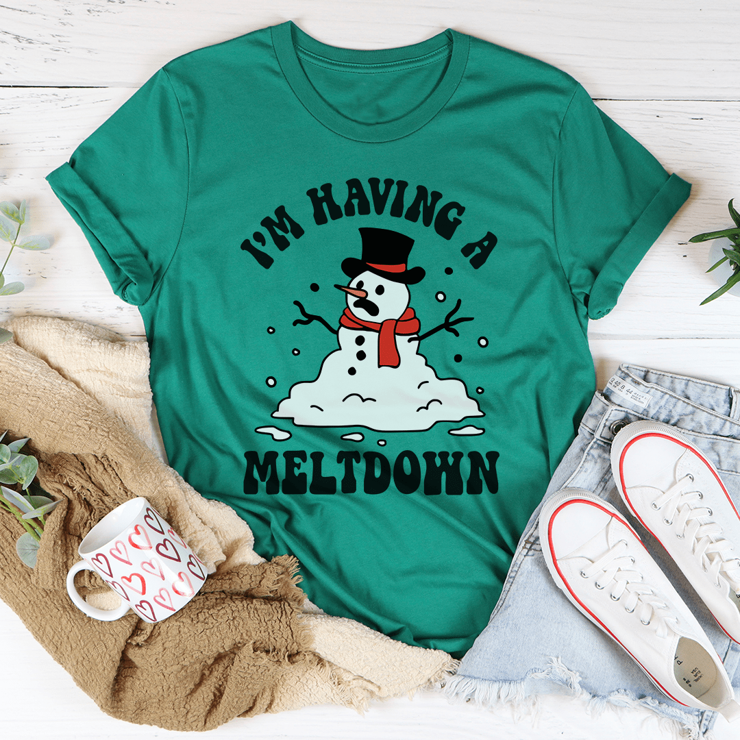 A festive I'm Having A Meltdown Tee featuring a cheerful holiday design, made from 100% soft cotton, perfect for Christmas celebrations.
