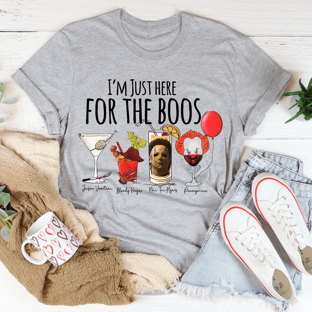 I'm Just Here For The Boos Tee featuring a spooky design, made from 100% soft cotton, perfect for Halloween celebrations.