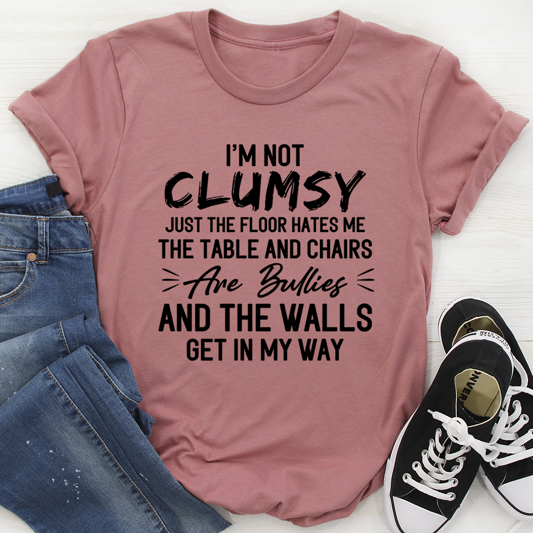 A stylish 'I'm Not Clumsy' T-Shirt made from soft ring-spun cotton, featuring a fun slogan and durable stitching.
