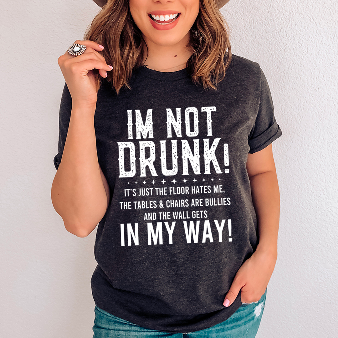 A comfortable 'I'm Not Drunk' T-Shirt made from soft ring-spun cotton, featuring a playful printed design.