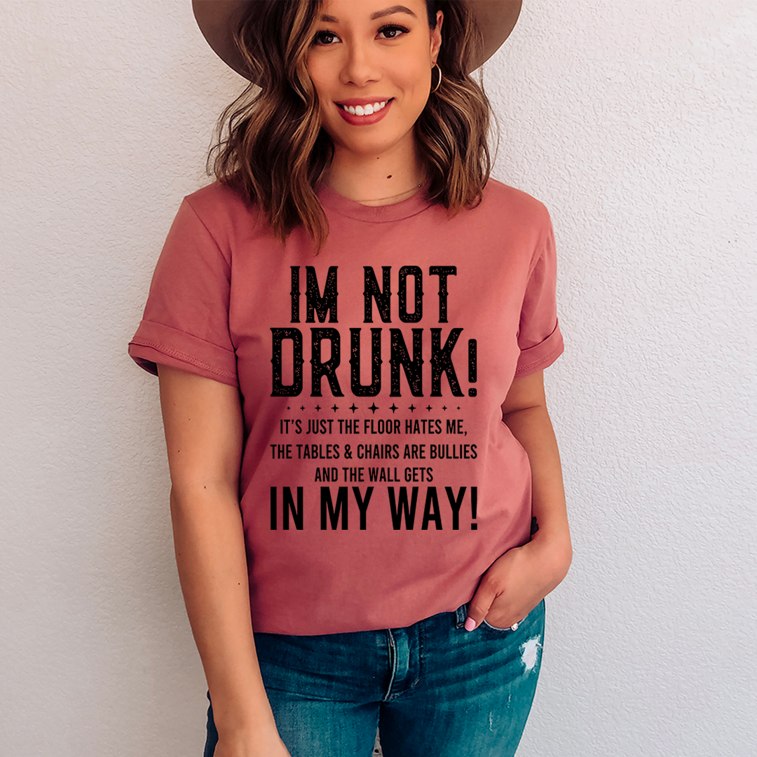 A comfortable 'I'm Not Drunk' T-Shirt made from soft ring-spun cotton, featuring a playful printed design.