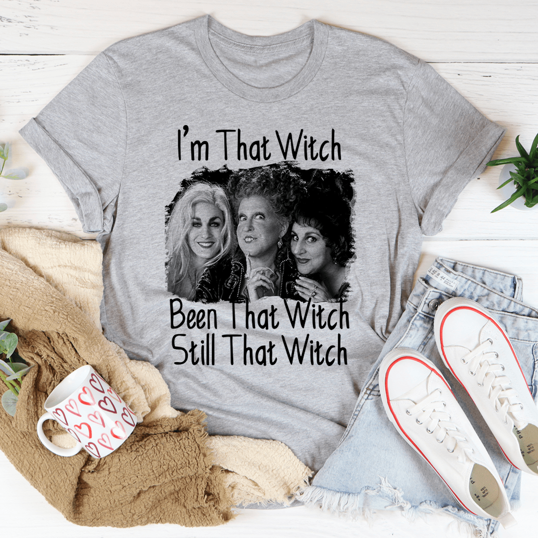 I'm That Witch Been That Witch Still That Witch Tee featuring a spooky design, made from 100% soft cotton, perfect for Halloween.
