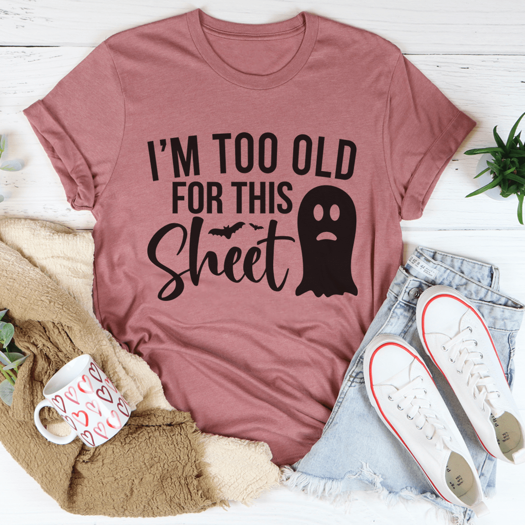 I'm Too Old For This Sheet Tee featuring a humorous Halloween design on a soft cotton fabric.