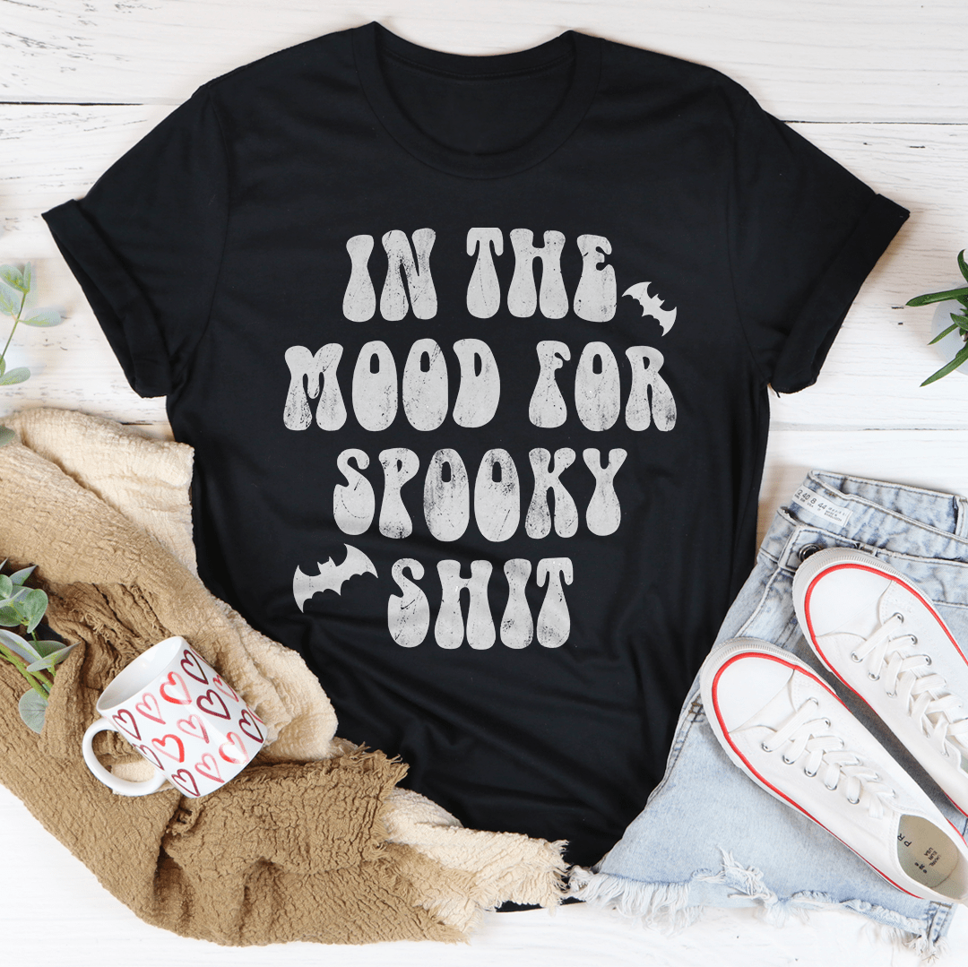 In The Mood Halloween Tee featuring a vibrant Halloween design on soft cotton fabric, perfect for festive celebrations.