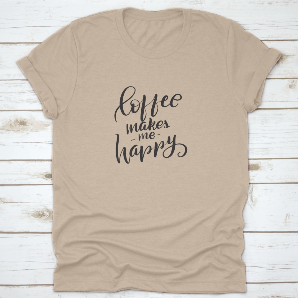 Inspirational t-shirt featuring handwritten brush lettering saying 'Coffee Makes Me Happy', made from soft cotton fabric.
