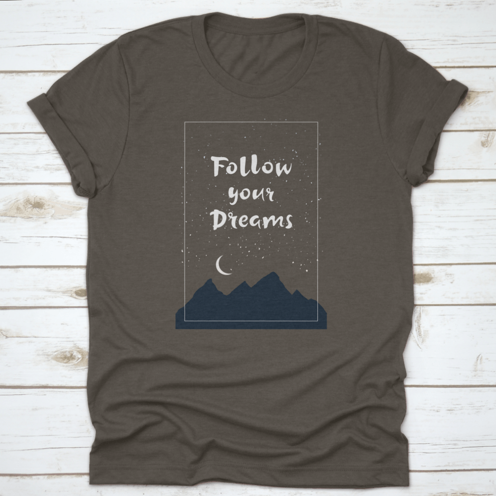 Inspirational 'Follow Your Dreams' T-shirt featuring hand-drawn lettering on a soft cotton fabric, showcasing a motivational design.