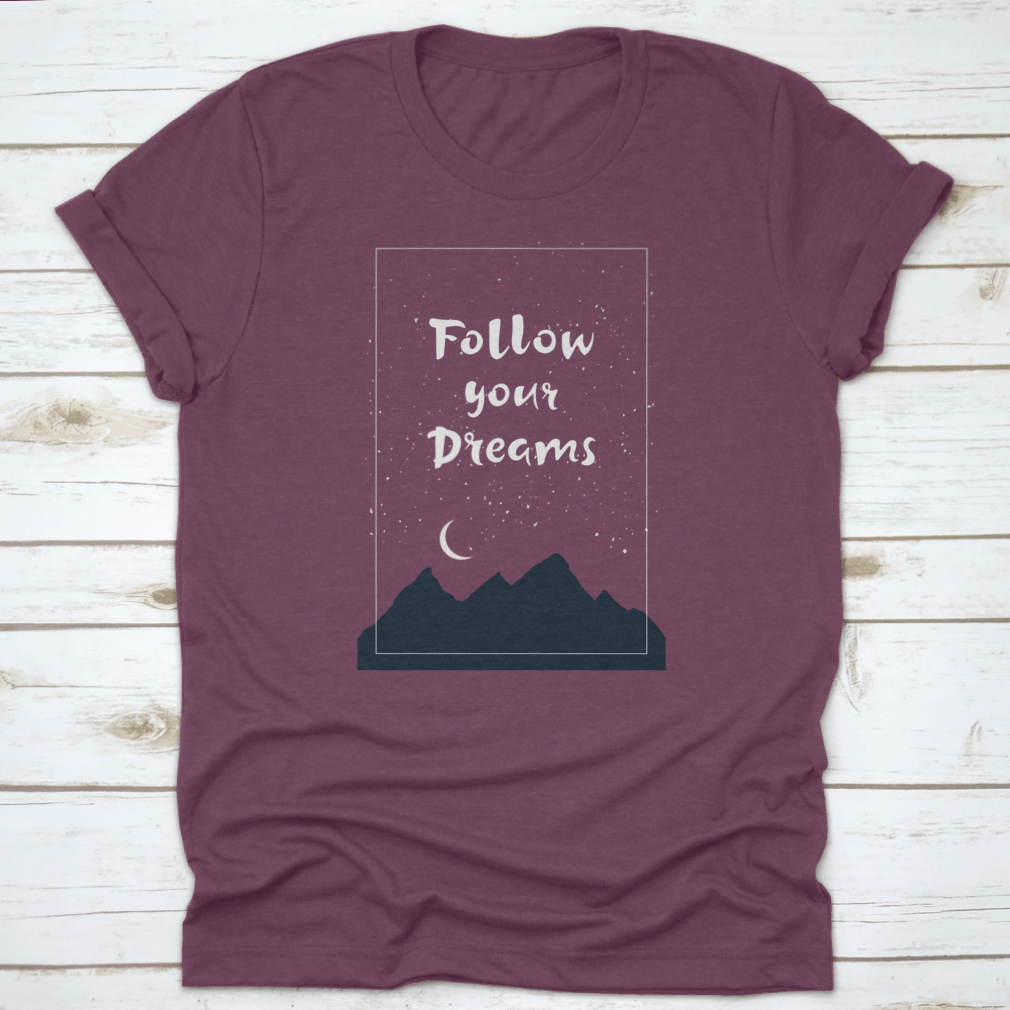 Inspirational 'Follow Your Dreams' T-shirt featuring hand-drawn lettering on a soft cotton fabric, showcasing a motivational design.