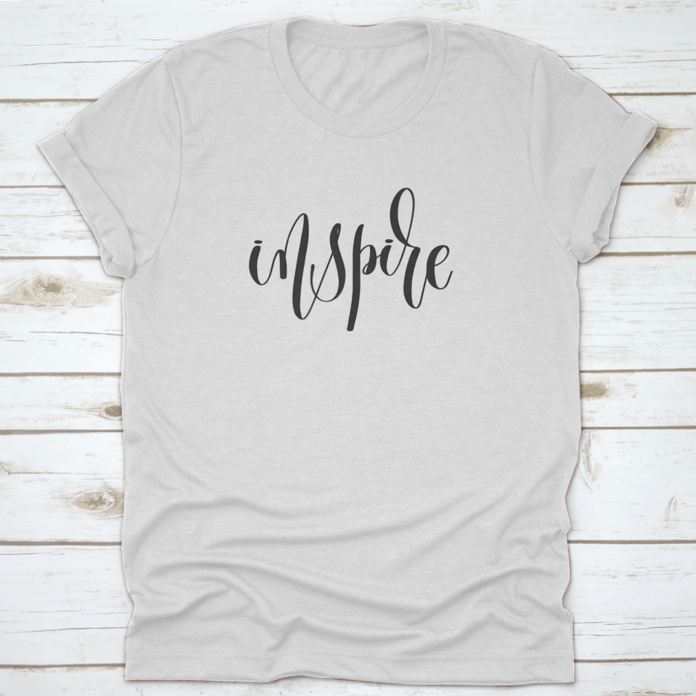 A stylish black t-shirt featuring an inspiring motivational quote in bold black ink, made from 100% cotton for comfort.