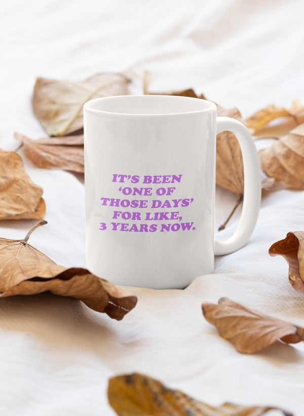 A stylish 11oz ceramic mug with a glossy finish, featuring the phrase 'It's Been One Of Those Days' in a fun font.