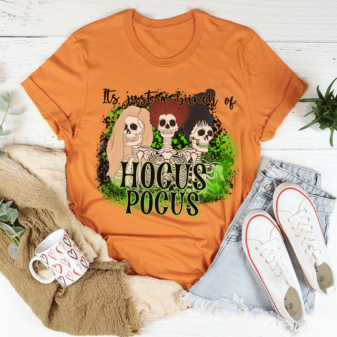 A collection of Halloween-themed tees featuring spooky designs, made from 100% soft cotton, showcasing vibrant colors and unique prints.