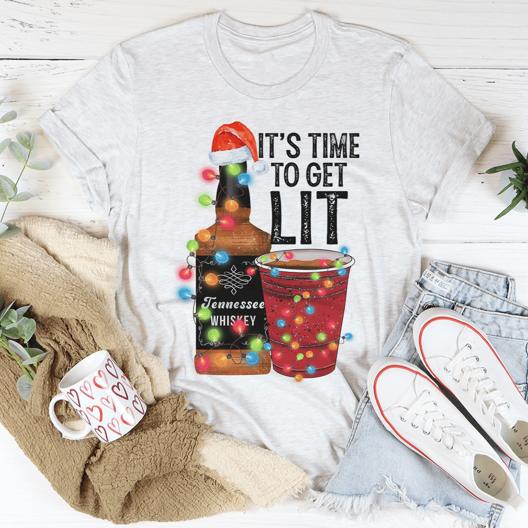 A festive Christmas-themed tee featuring the phrase 'It's Time To Get Lit', made from 100% soft cotton with vibrant digital printing.