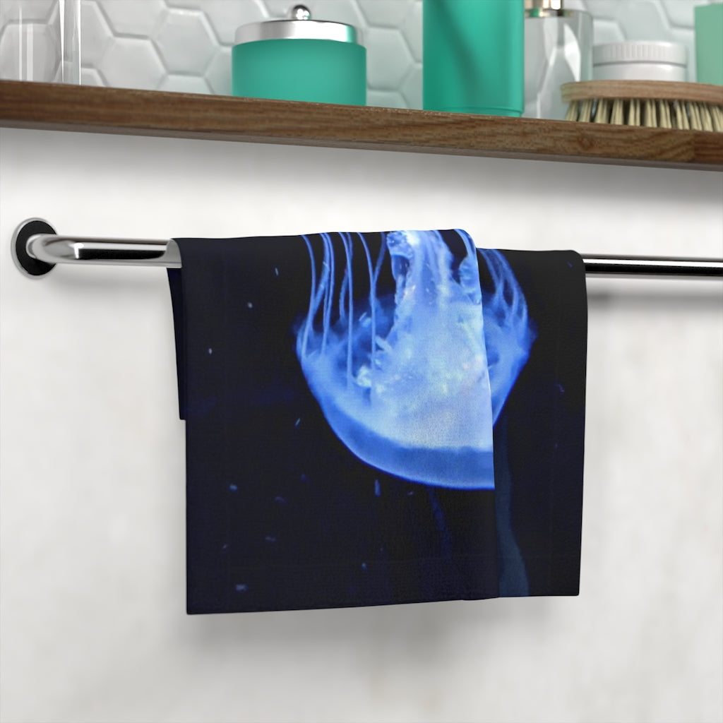 A colorful Jellyfish Face Towel featuring a customizable polyester front and soft cotton back, perfect for personalizing your bathroom.