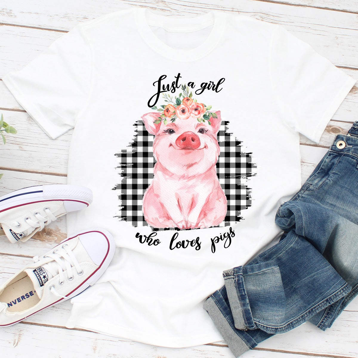 A stylish t-shirt featuring a playful design that expresses love for pigs, made from soft ring-spun cotton.