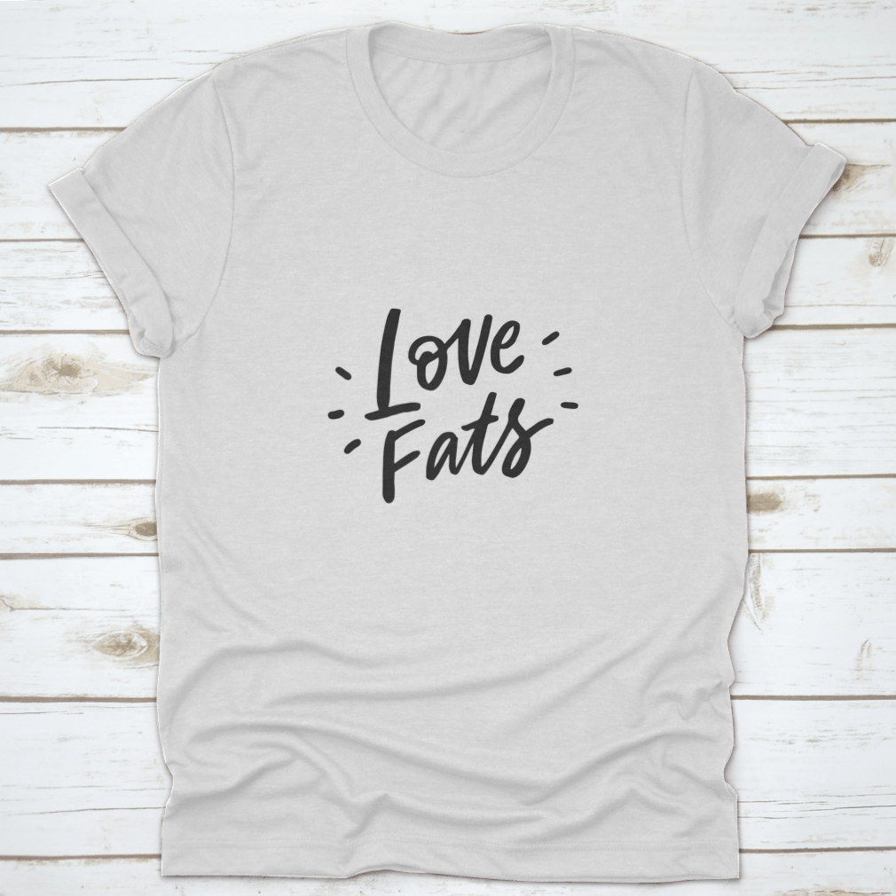 Keto Diet Hand Drawn Lettering design on a comfortable cotton shirt, showcasing the phrase 'Love Fats' in a stylish font.