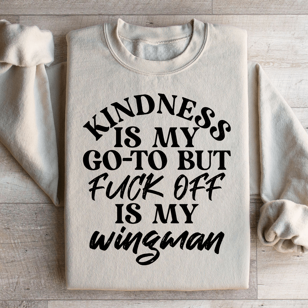 A cozy 'Kindness Is My Go To' sweatshirt featuring a unique design by top artists, made from a warm cotton/poly fleece blend.