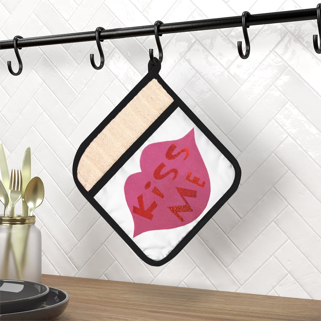 Kiss Me Pot Holder with Pocket, stylish kitchen accessory, heat resistant, featuring a black cotton hanging loop.