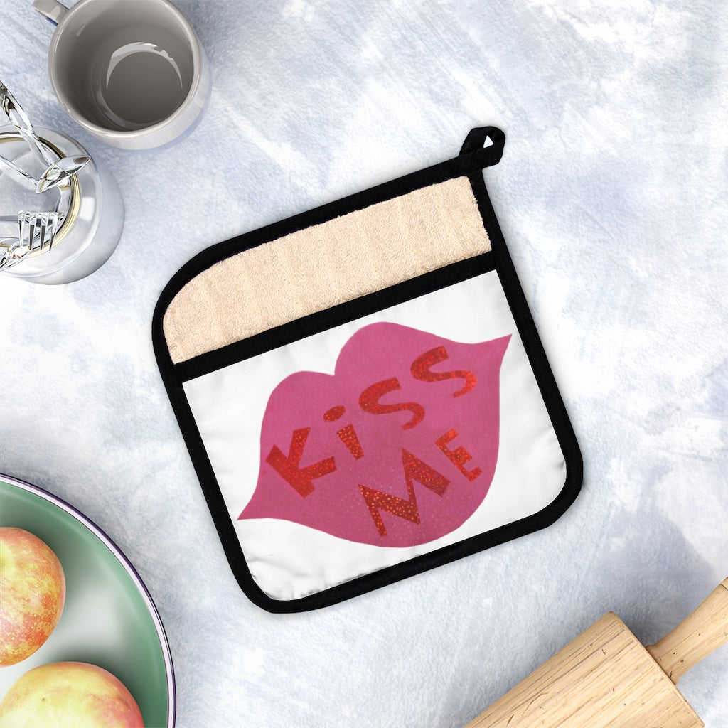 Kiss Me Pot Holder with Pocket, stylish kitchen accessory, heat resistant, featuring a black cotton hanging loop.