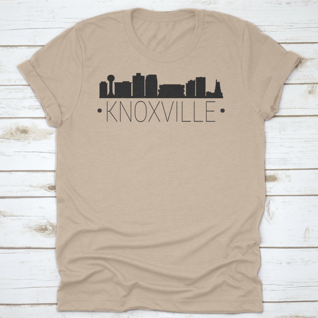 A stylish t-shirt featuring the silhouette of the Knoxville Tennessee skyline, showcasing iconic buildings and landmarks.