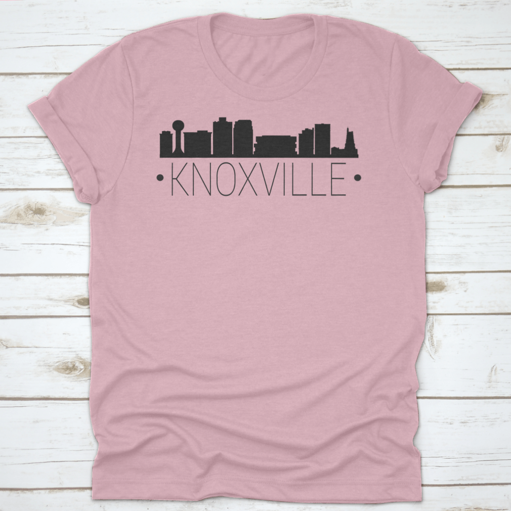 A stylish t-shirt featuring the silhouette of the Knoxville Tennessee skyline, showcasing iconic buildings and landmarks.