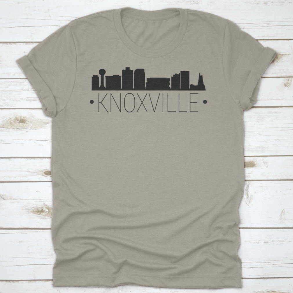 A stylish t-shirt featuring the silhouette of the Knoxville Tennessee skyline, showcasing iconic buildings and landmarks.