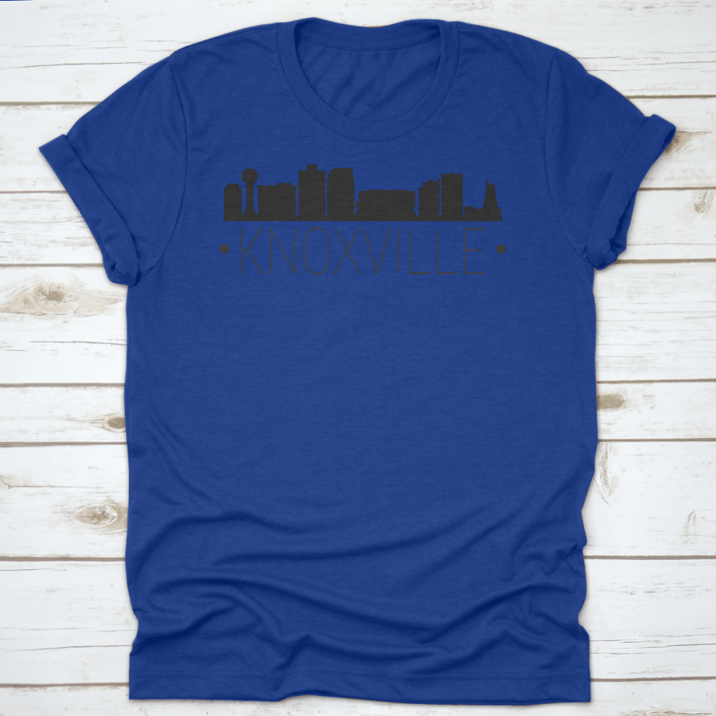 A stylish t-shirt featuring the silhouette of the Knoxville Tennessee skyline, showcasing iconic buildings and landmarks.