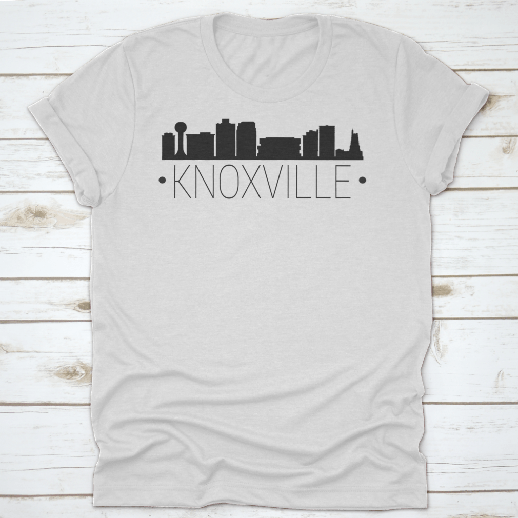 A stylish t-shirt featuring the silhouette of the Knoxville Tennessee skyline, showcasing iconic buildings and landmarks.
