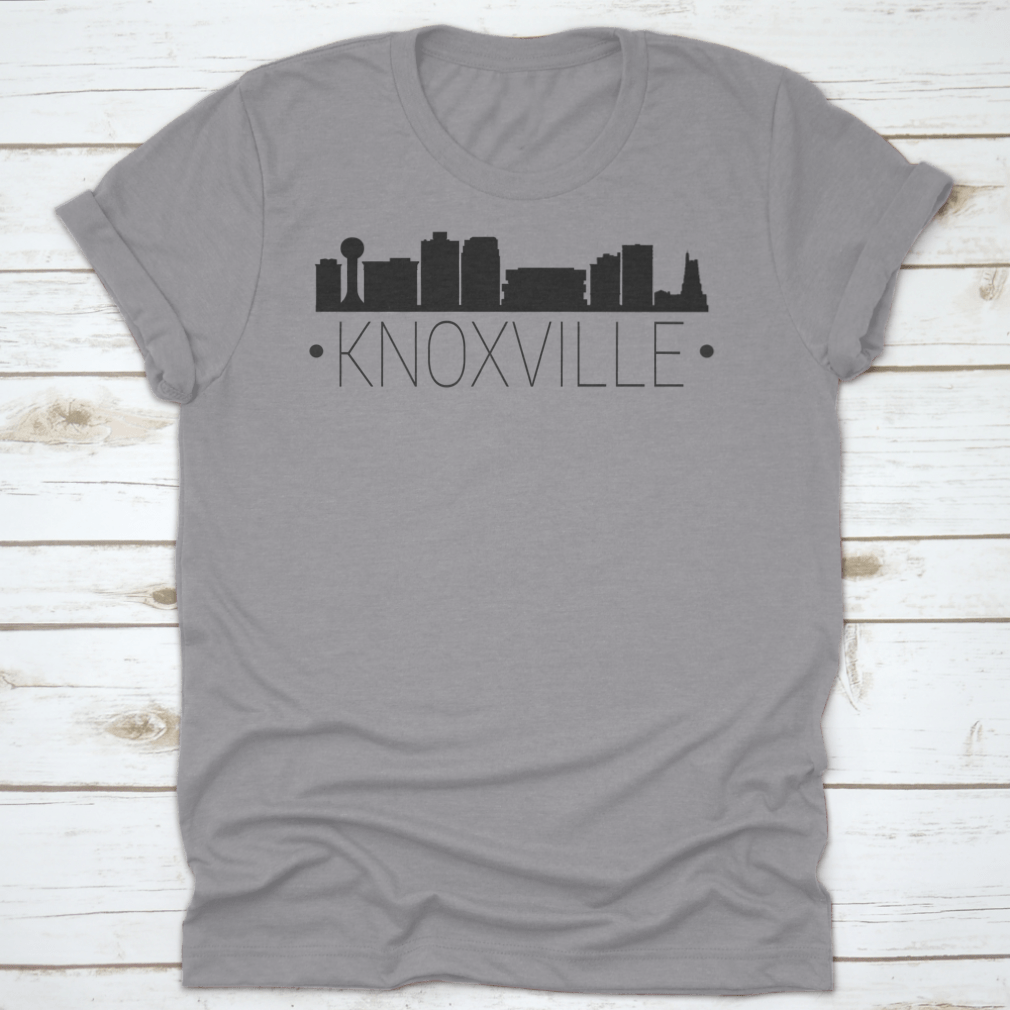 A stylish t-shirt featuring the silhouette of the Knoxville Tennessee skyline, showcasing iconic buildings and landmarks.
