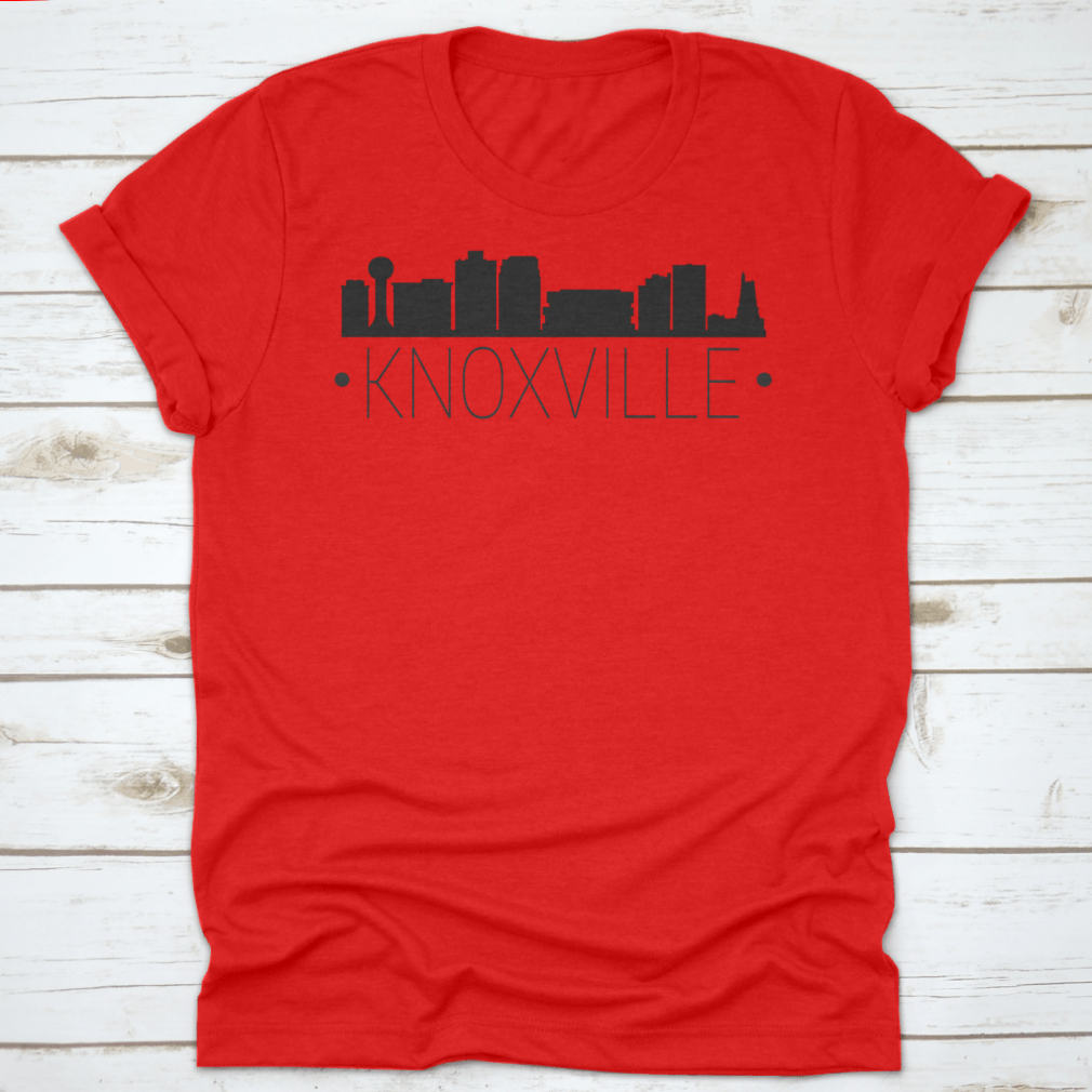 A stylish t-shirt featuring the silhouette of the Knoxville Tennessee skyline, showcasing iconic buildings and landmarks.