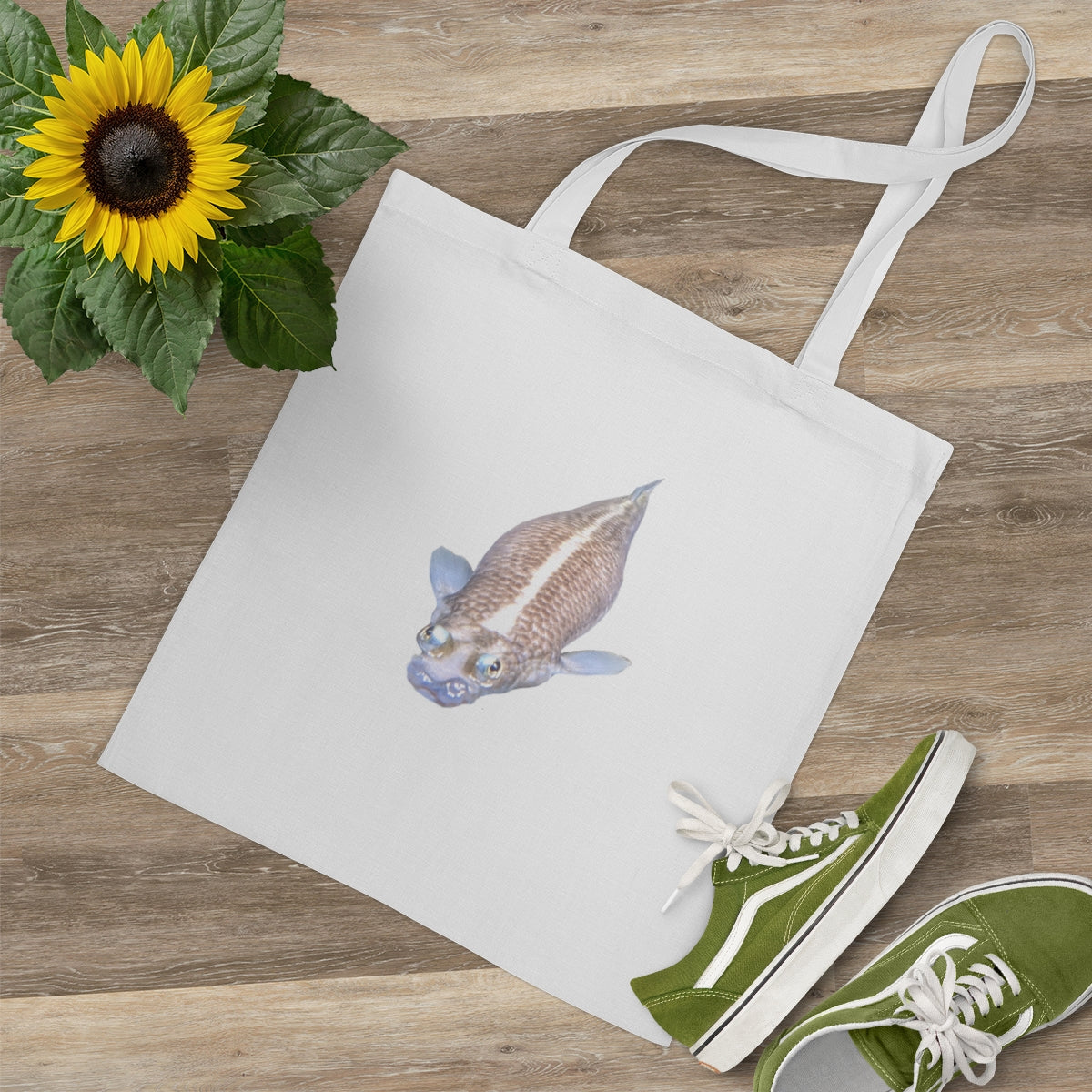 A vibrant Koi Fish Tote Bag made of 100% cotton with cross-stitched handles, showcasing a colorful koi fish design.