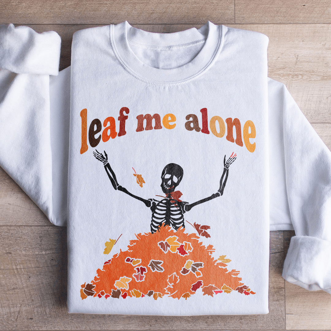 Leaf Me Alone Fall sweats featuring unique artistic designs, warm fleece lining, and adjustable cuffs for comfort.