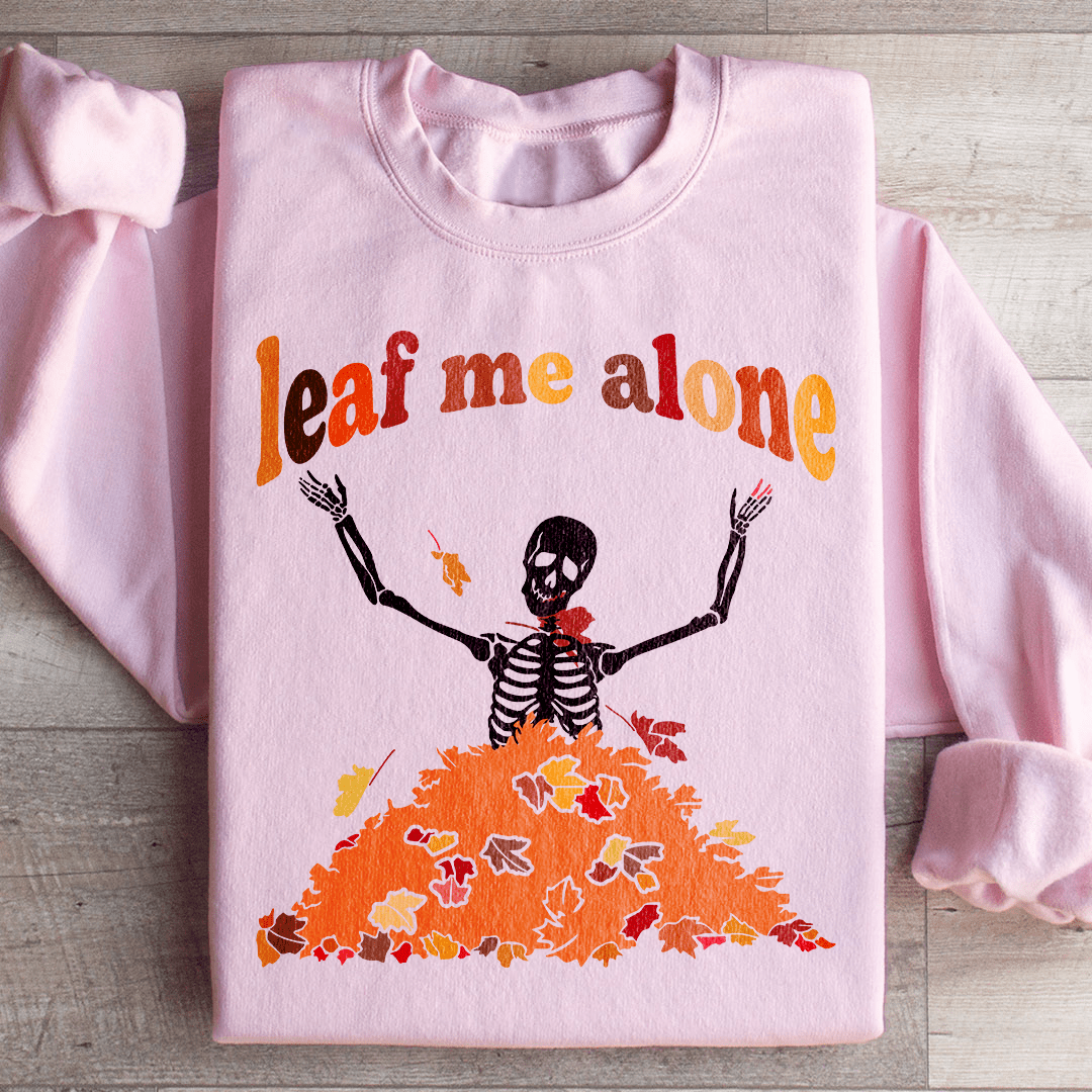 Leaf Me Alone Fall sweats featuring unique artistic designs, warm fleece lining, and adjustable cuffs for comfort.