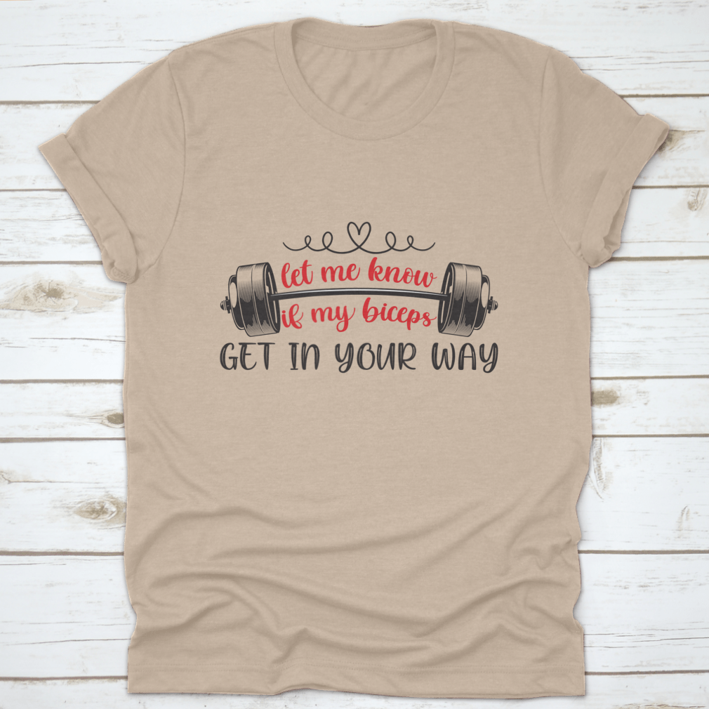 A stylish t-shirt featuring the phrase 'Let Me Know If My Biceps Get In Your Way' in a bold design, made from high-quality cotton.