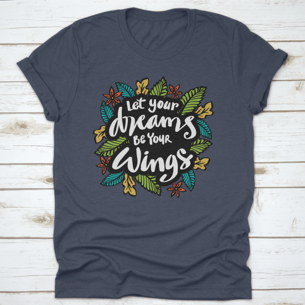 A stylish t-shirt featuring the inspirational quote 'Let Your Dreams Be Your Wings' in a beautiful design, made from soft cotton fabric.