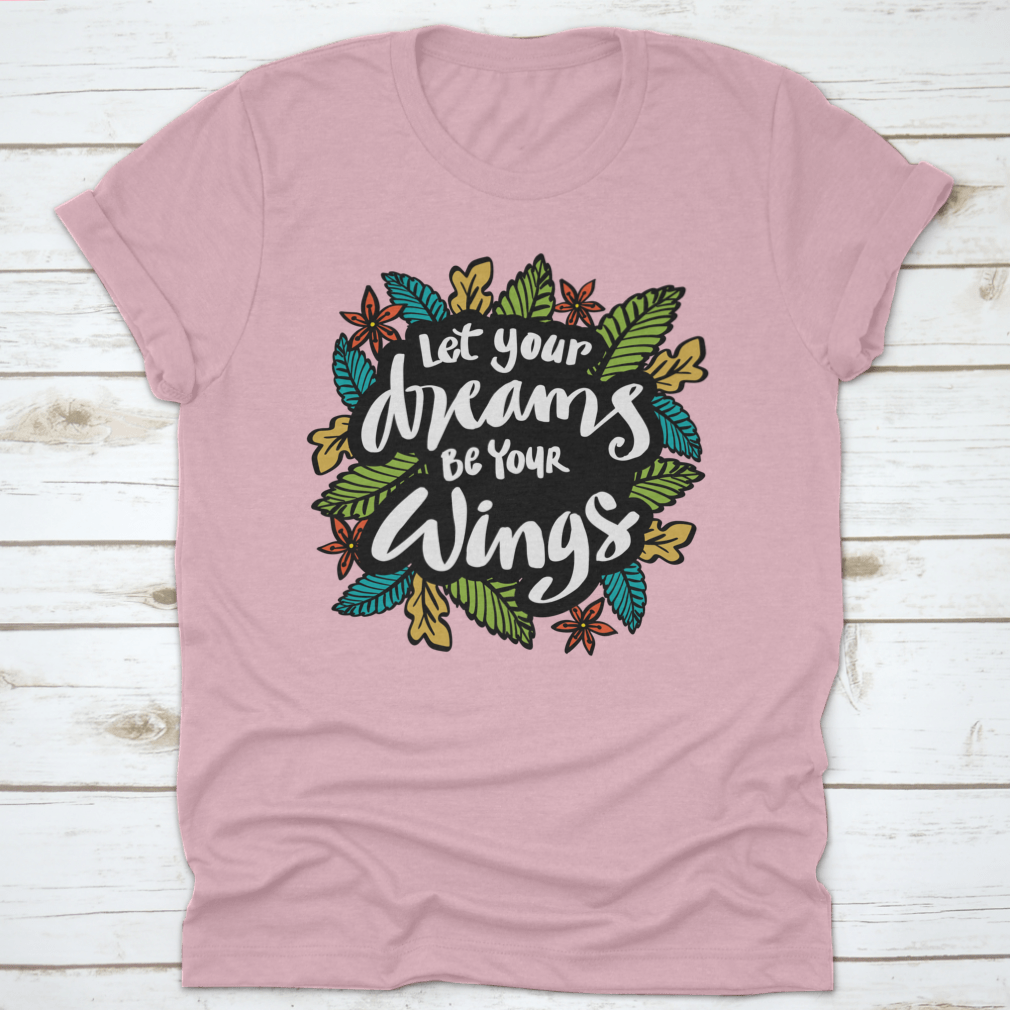 A stylish t-shirt featuring the inspirational quote 'Let Your Dreams Be Your Wings' in a beautiful design, made from soft cotton fabric.