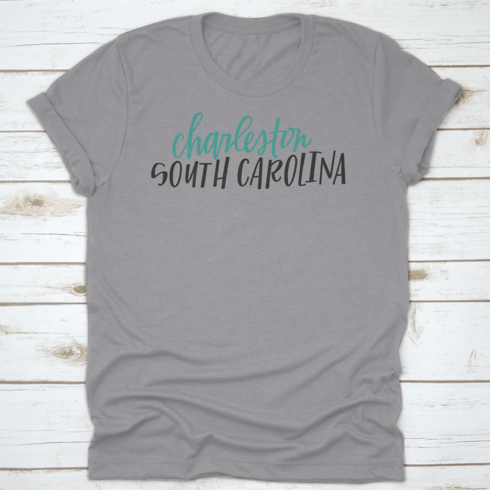 Lettering of Charleston, South Carolina typography design on a cotton shirt, showcasing vibrant colors and classic fit.