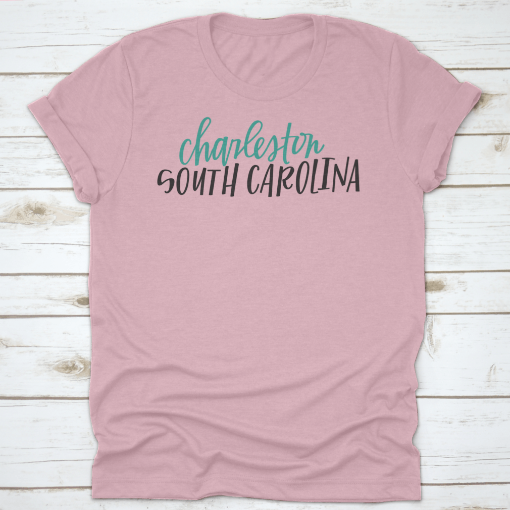 Lettering of Charleston, South Carolina typography design on a cotton shirt, showcasing vibrant colors and classic fit.
