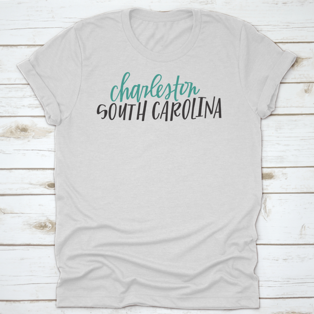 Lettering of Charleston, South Carolina typography design on a cotton shirt, showcasing vibrant colors and classic fit.