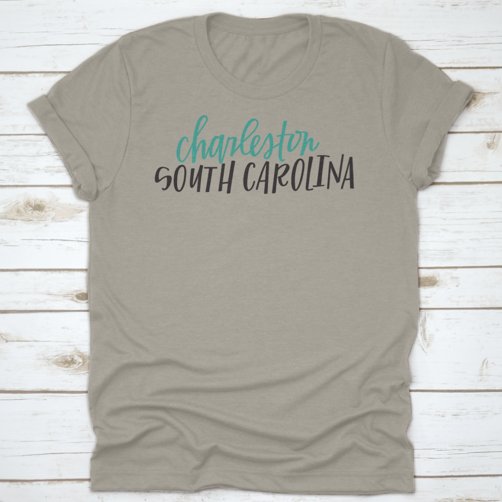 Lettering of Charleston, South Carolina typography design on a cotton shirt, showcasing vibrant colors and classic fit.