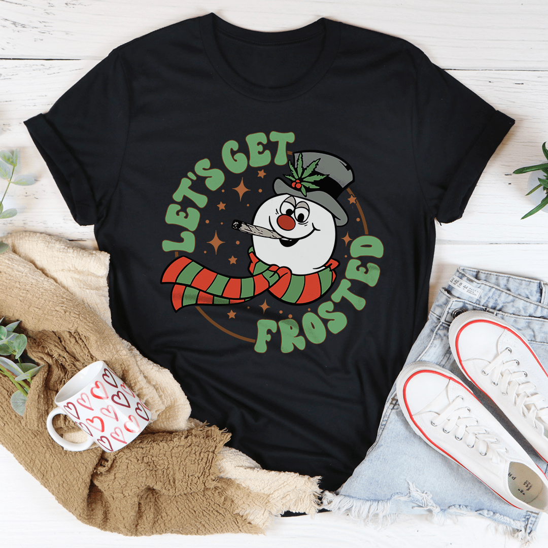 A festive Let's Get Frosted Tee featuring a cheerful Christmas design, made from 100% soft cotton, perfect for holiday celebrations.